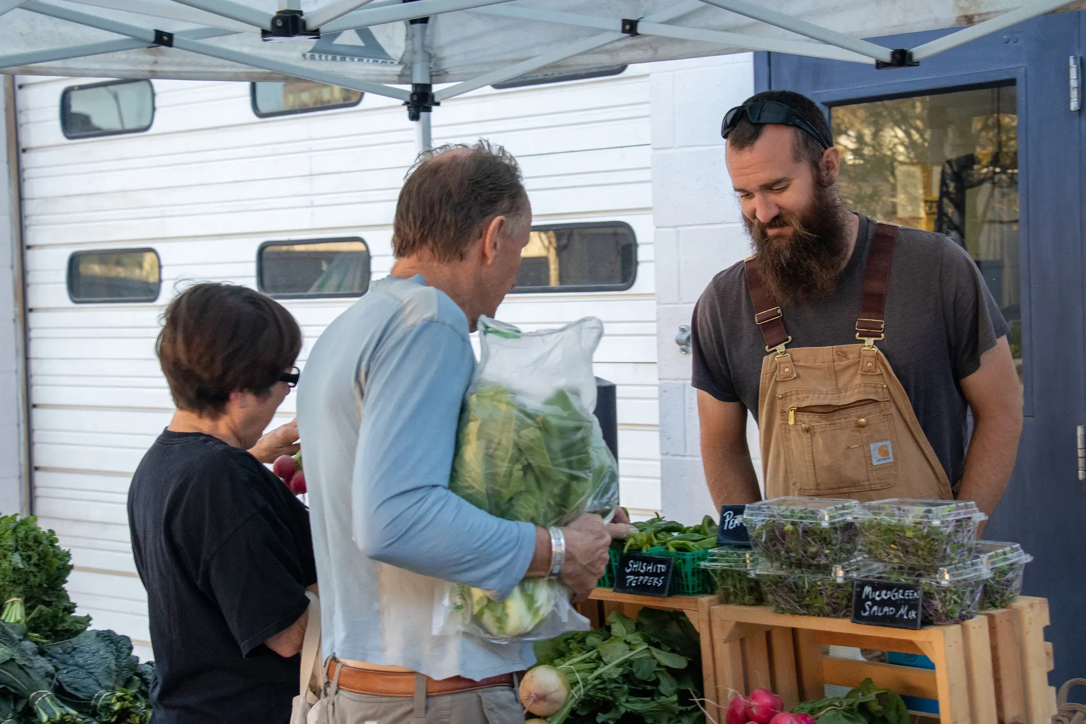 farmer selling microgreens